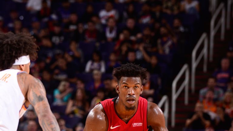 Jimmy Butler dribbles against the Phoenix Suns