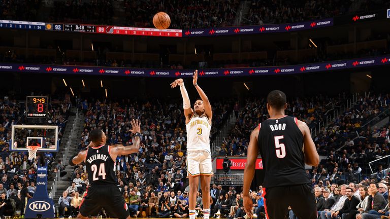 Jordan Poole fires away from three against the Portland Trail Blazers