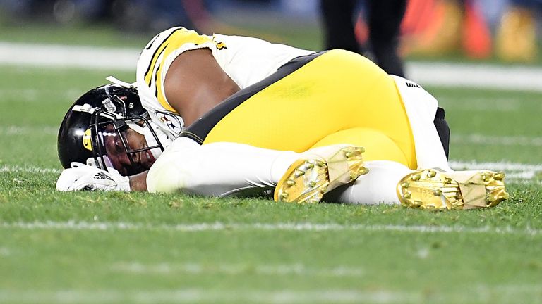 Pittsburgh Steelers wide receiver Juju Smith-Schuster lies injured on the turf