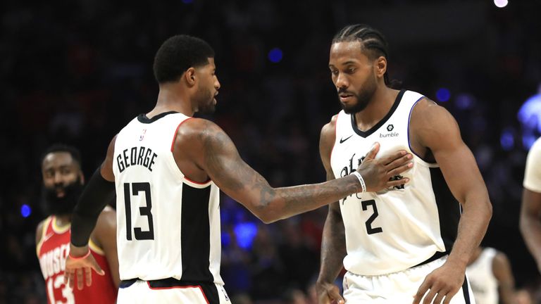Paul George congratulates Kawhi Leonard during the LA Clippers' thrilling win over the Houston Rockets