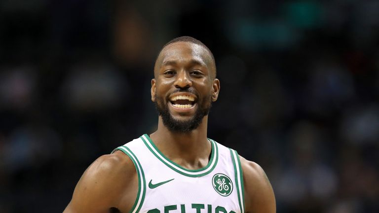 Kemba Walker reacts after receiving a warm welcome on his return to Charlotte