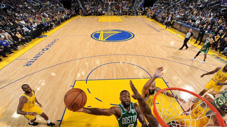 Kemba Walker finishes at the rim during the Celtics' win over Golden State