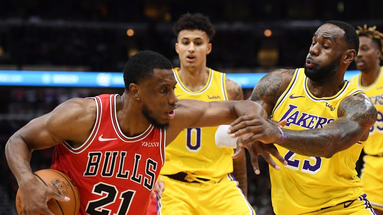 LeBron James grapples for possession against the Chicago Bulls