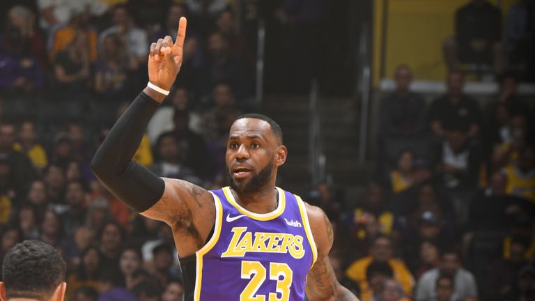 LeBron James controls possession against the Sacramento Kings