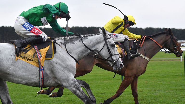 Lostintranslation ridden by Robbie Power (right) goes on to win The Betfair Steeple Chase (Grade 1) during Betfair Chase Day at Haydock Park Racecourse. PA Photo. Picture date: Saturday November 23, 2019. See PA story RACING Haydock. Photo credit should read: Anthony Devlin/PA Wire