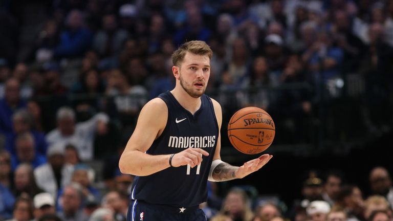 Luka Doncic dribbles the ball upcourt against the New York Knicks