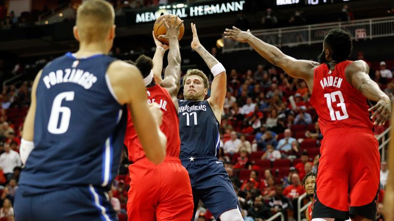 Luka Doncic shoots over Houston's Danuel House