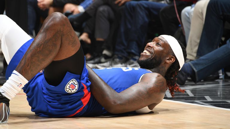 Montrezl Harrell smiles after drawing a foul against the Pelicans
