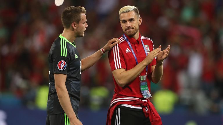Wales' Chris Gunter and Aaron Ramsey during the UEFA Euro 2016 Semi Final match between Portugal and Wales at Stade des Lumieres on July 6, 2016 in Lyon, France.
