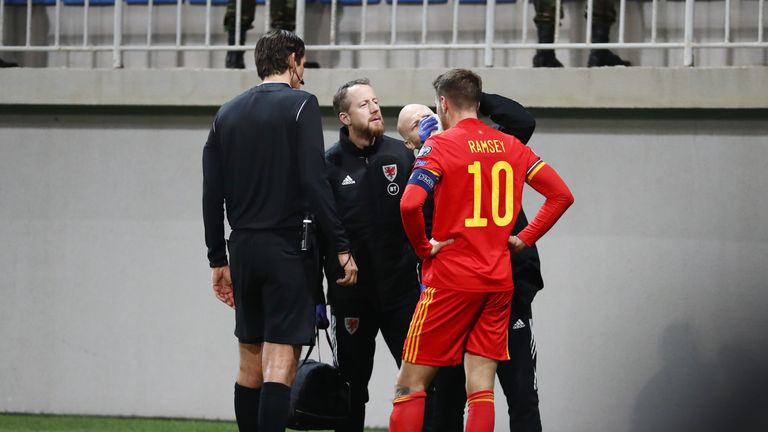 BAKU, AZERBAIJAN - NOVEMBER 16:  Aaron Ramsey of Wales is treated for an injury during UEFA Euro 2020 Group E Qualifier match match between Azerbaijan and Wales at Bakcell Arena on November 16, 2019 in Baku, Azerbaijan. (Photo by Aziz Karimov/Getty Images)