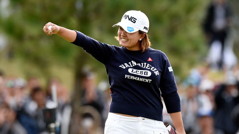 Ai Suzuki celebrates after birdieing the 18th to wrap up her victory in the Japan Classic