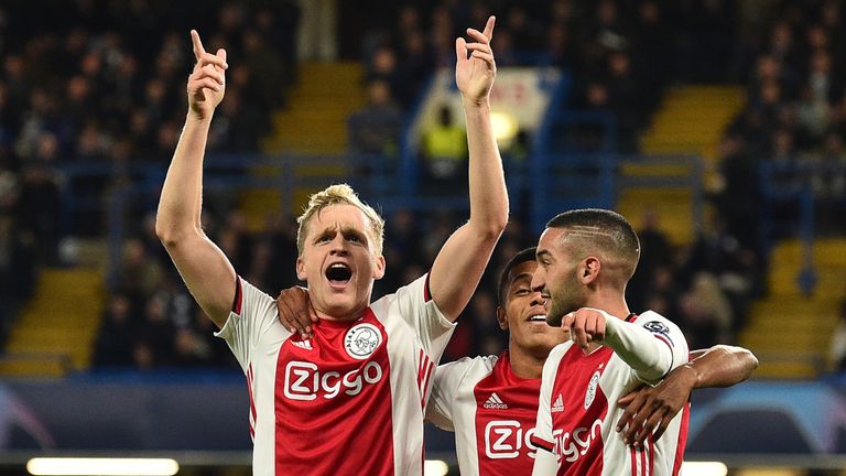 Donny Van de Beek (L) celebrates with Ajax team-mates after scoring their fourth goal against Chelsea
