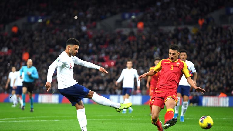 Alex Oxlade-Chamberlain scores England's opening goal against Montenegro