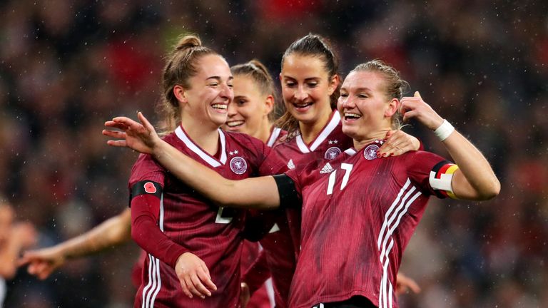 Alexandra Popp celebrates scoring the opening goal vs England Women at Wembley Stadium