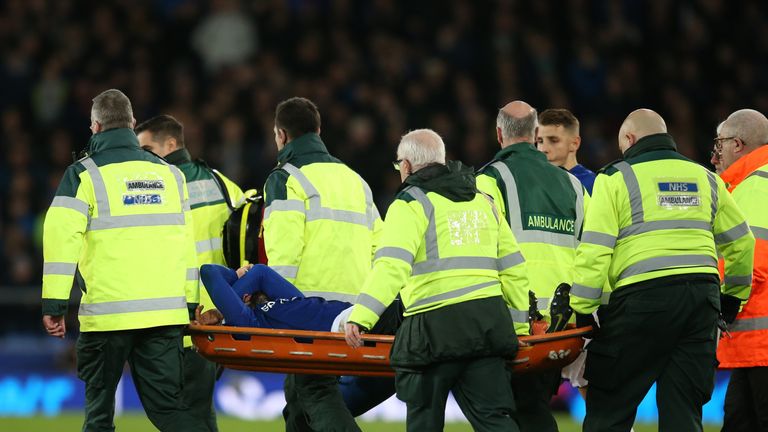 Everton's Andre Gomes is stretchered off injured against Tottenham