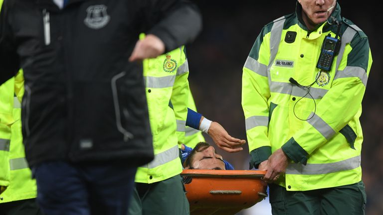 Andre Gomes is stretchered off after suffering an injury to his right ankle during the Premier League match between Everton and Spurs at Goodison Park