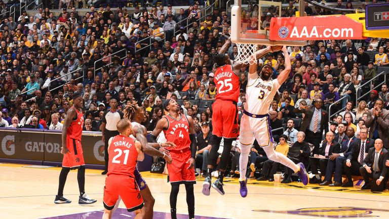 Anthony Davis of the Los Angeles Lakers drives to the basket against the Toronto Raptors