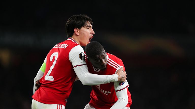 Nicolas Pepe celebrates with Hector Bellerin against Vitoria