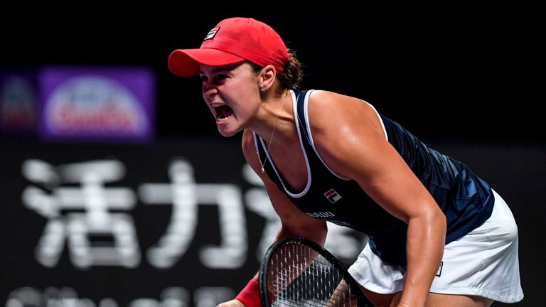 Ashleigh Barty of Australia reacts after winning against Elina Svitolina of Ukraine in their women's singles in the WTA Finals tennis tournament in Shenzhen on November 3, 201