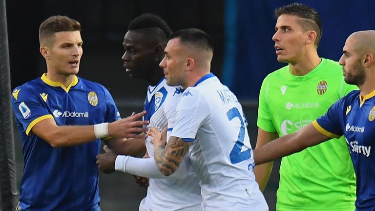 VERONA, ITALY - NOVEMBER 03: Mario Balotelli #45 of Brescia Calcio reacts to racist chants from Verona fans during the Serie A match between Hellas Verona and Brescia Calcio at Stadio Marcantonio Bentegodi on November 3, 2019 in Verona, Italy. (Photo by Alessandro Sabattini/Getty Images)