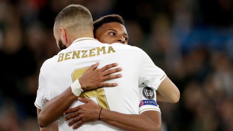Karim Benzema and Rodrygo celebrate for Real Madrid.