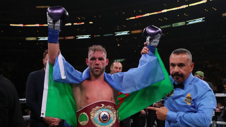Billy Joe Saunders celebrates after retaining his WBO title