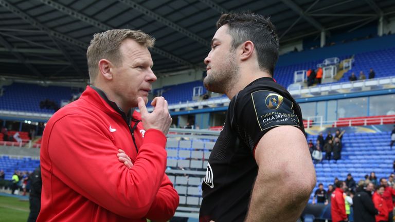 Mark McCall, (L) the Saracens director of rugby, chats to his captain Brad Barritt after their victory during the European Rugby Champions Cup semi final match between Saracens and Wasps at Madejski Stadium on April 23, 2016 in Reading, England. 