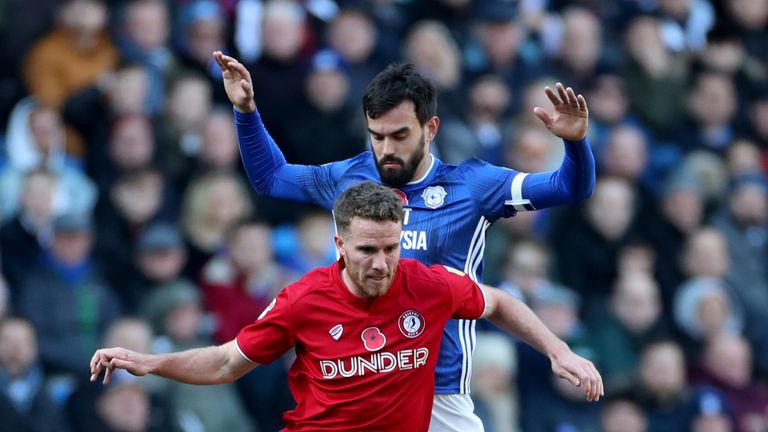 Bristol City's Marley Watkins (left) in action with Cardiff's Marlon Pack