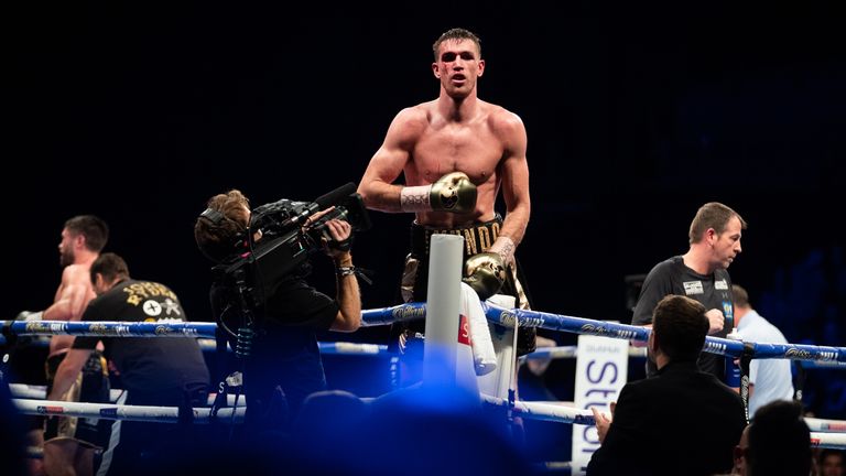 Callum Smith celebrates after defending his world title in Liverpool