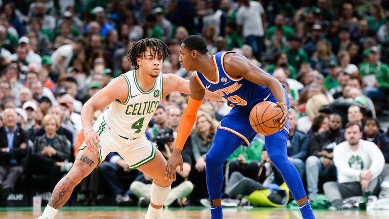 Carsen Edwards of the Boston Celtics defends R.J. Barrett of the New York Knicks