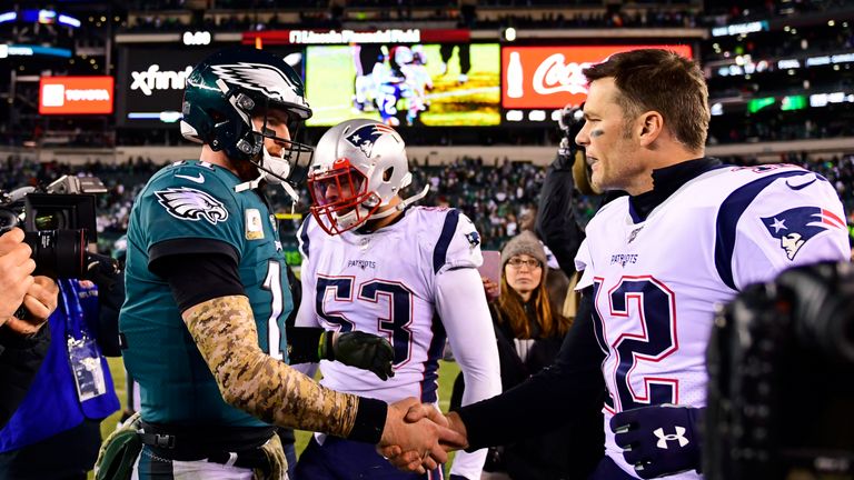 PHILADELPHIA, PA - NOVEMBER 17: Carson Wentz #11 of the Philadelphia Eagles and Tom Brady #12 of the New England Patriots shake hands after the game at Lincoln Financial Field on November 17, 2019 in Philadelphia, Pennsylvania. The Patriots defeated the Eagles 17-10. (Photo by Corey Perrine/Getty Images)