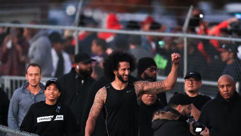 Colin Kaepernick visits with fans following his NFL workout