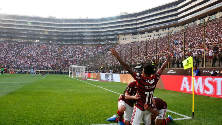 Flamengo players celebrate their last-gasp victory