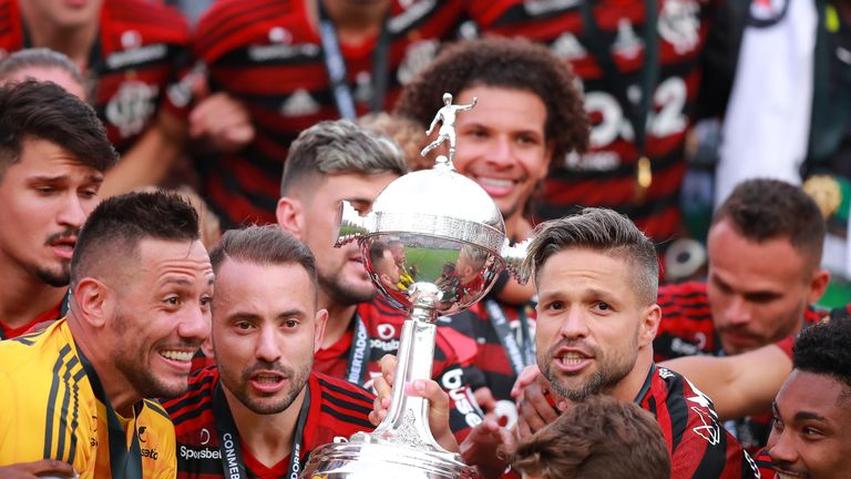 Flamengo lift the trophy after their dramatic late win