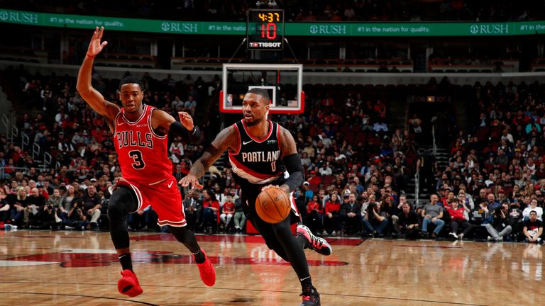  Damian Lillard #0 of the Portland Trail Blazers handles the ball against the Chicago Bulls on November 25, 2019 at United Center in Chicago, Illinois.