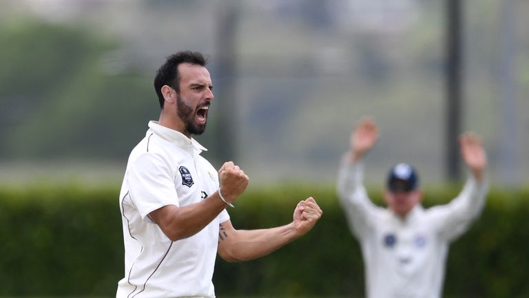  Daryl Mitchell of New Zealand A celebrates dismissing England captain Joe Root during day two of the tour match between New Zealand A and England at Cobham Oval on November 16, 2019