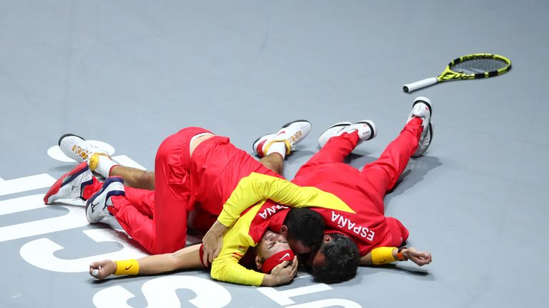 Nadal was mobbed by his team-mates after securing Spain's first Davis Cup title since 2011