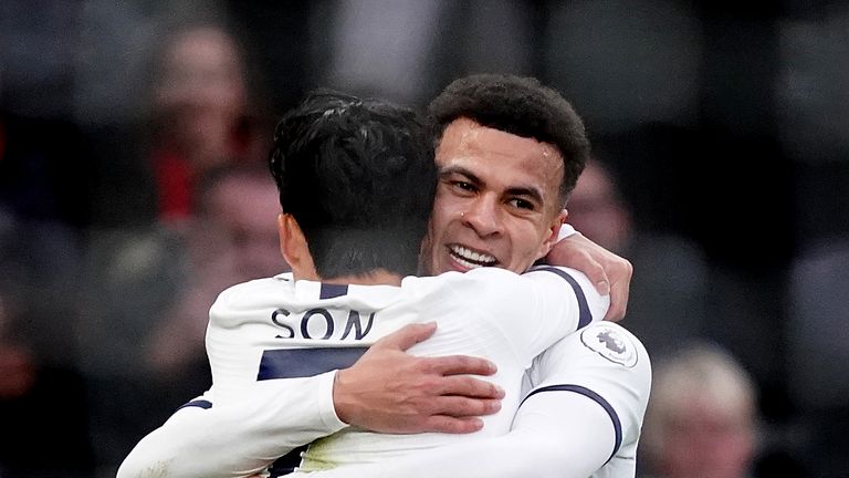 Dele Alli is hugged by Heung-Min Son after putting Tottenham 1-0 up against Bournemouth