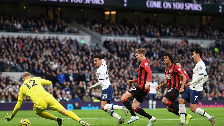 Dele Alli slides in the game's opening goal after 21 minutes against Bournemouth