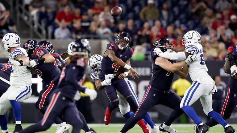 Quarterback Deshaun Watson of the Houston Texans delivers a pass over the defence of the Indianapolis Colts