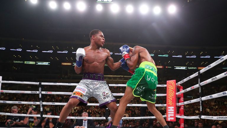 November 9, 2019; Los Angeles, CA, USA; WBC lightweight champion Devin Haney and Alfredo Santiago during their bout at the Staples Center in Los Angeles, CA.  Mandatory Credit: Ed Mulholland/Matchroom Boxing USA