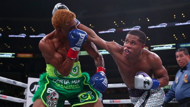 November 9, 2019; Los Angeles, CA, USA; WBC lightweight champion Devin Haney and Alfredo Santiago during their bout at the Staples Center in Los Angeles, CA.  Mandatory Credit: Ed Mulholland/Matchroom Boxing USA