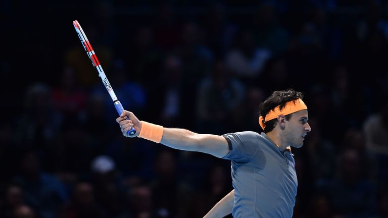 Austria's Dominic Thiem returns against Serbia's Novak Djokovic during their men's singles round-robin match on day three of the ATP World Tour Finals tennis tournament at the O2 Arena in London on November 12, 2019.