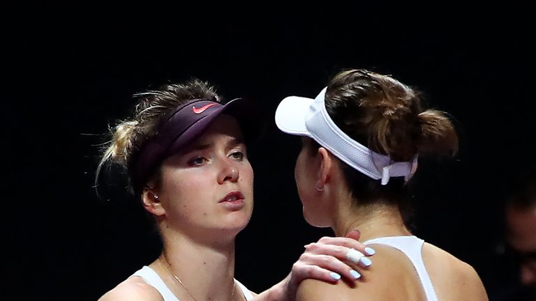 Belinda Bencic (R) of Switzerland is consoled by Elina Svitolina of Ukraine after her retirement from their Women's Singles semifinal match on Day Seven of the 2019 Shiseido WTA Finals at Shenzhen Bay Sports Center on November 02, 2019 in Shenzhen, China