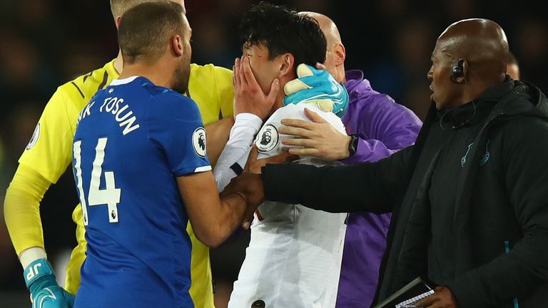 Heung-Min Son of Tottenham looks on in horror after a tackle on  Andre Gomes of Everton which resulted in a red card and Gomes suffering a serious injury