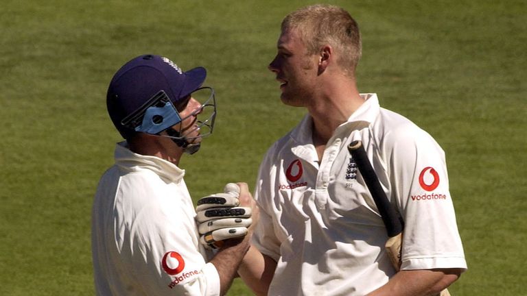 England batsman Andrew Flintoff celebrates his maiden test century with Graham Thorpe during the Third day of the First Test between New Zealand and England in March 2002.