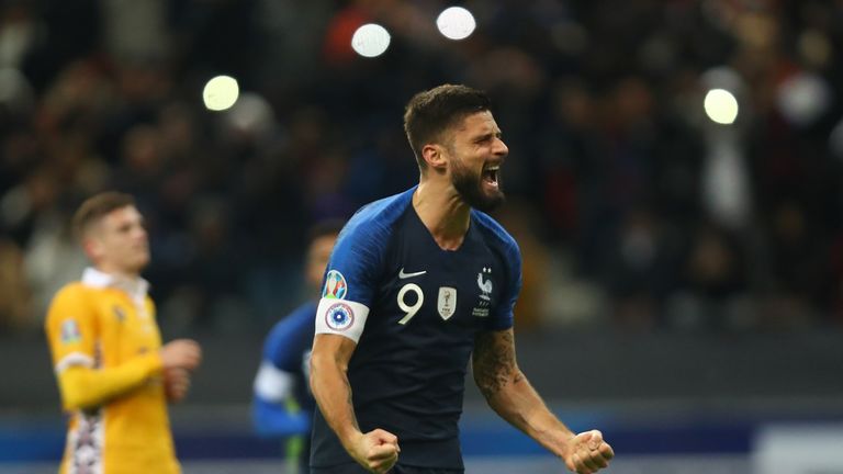 Olivier Giroud celebrates after scoring France's winner against Moldova
