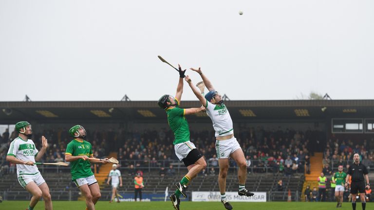 Get up there! Brian Cody of Ballyhale Shamrocks and Luke Folan of Clonkill compete for a high ball
