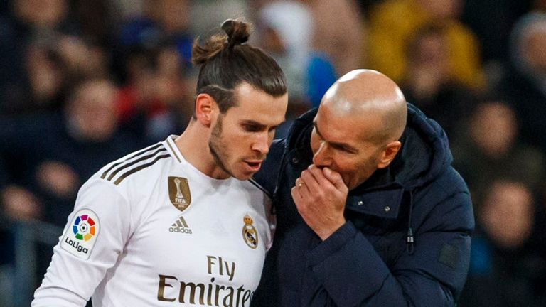 Gareth Bale of Real Madrid speaks with Zinedine Zidane of Real Madrid during the La Liga match between Real Madrid CF and Real Sociedad at Estadio Santiago Bernabeu on November 23, 2019 in Madrid, Spain.