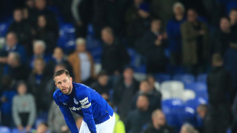 Gylfi Sigurdsson slumps to his haunches after the loss to Norwich